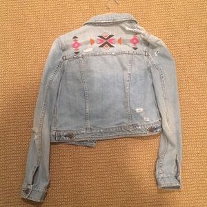 Distressed jean jacket